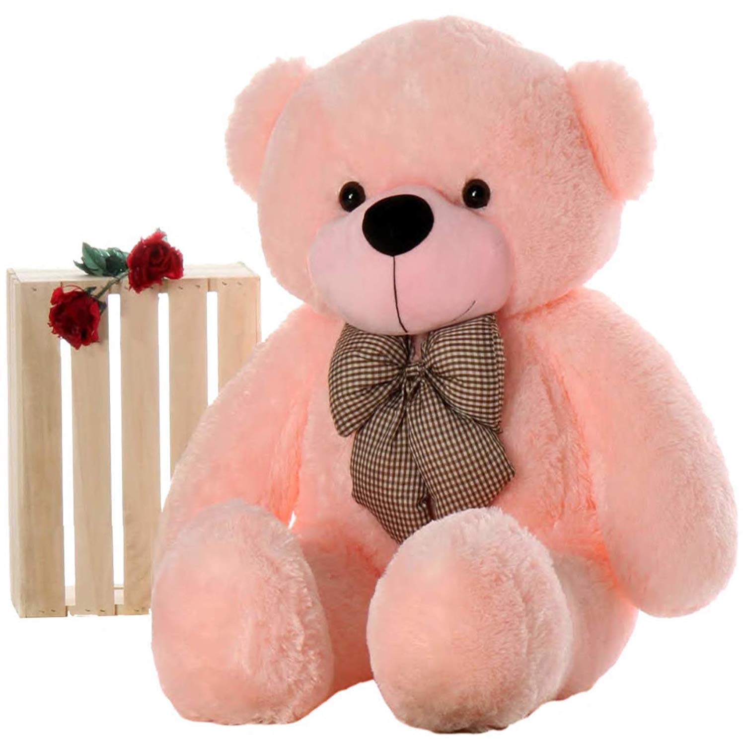 Pink plush teddy bear with bow