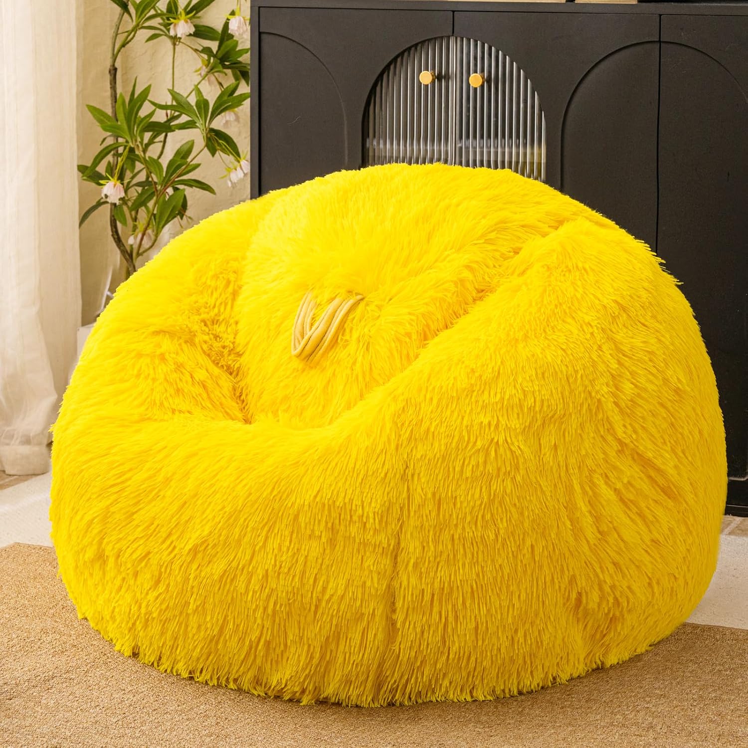 Fluffy yellow pouf